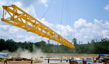A three-section assembly of IMETCO's Spreader Bar Made Lifting These 160-ft Curved Panels Easy A three-section assembly of IMETCO's Spreader Bar Made Lifting These 160-ft Curved Panels Easy